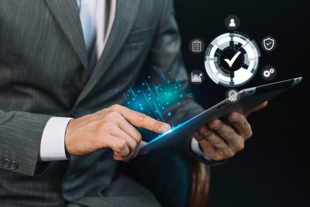 Standard quality control concept with a businessman interacting with digital tablet, emphasizing quality assurance in business services